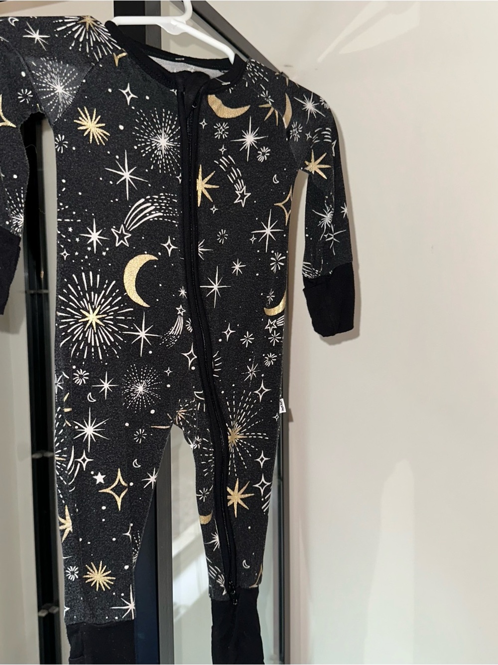 Little Sleepies Black One-Piece with Gold & White Celestial Print